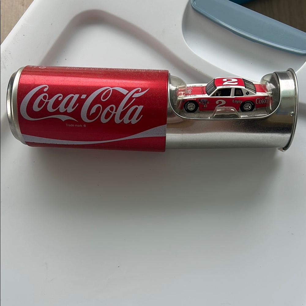 Coca-Cola Red Can with Toy Car